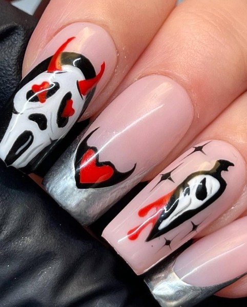 Sexy, warm, and versatile, red and black can turn any design into the perfect moody manicure. Browse 17 of our favorite combinations, here.