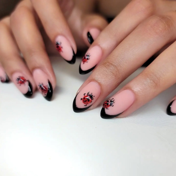 Sexy, warm, and versatile, red and black can turn any design into the perfect moody manicure. Browse 17 of our favorite combinations, here.