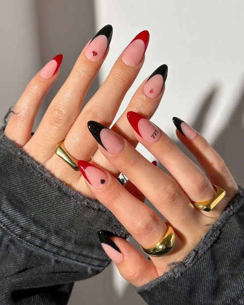 Sexy, warm, and versatile, red and black can turn any design into the perfect moody manicure. Browse 17 of our favorite combinations, here.