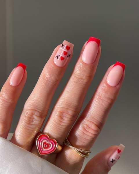 Sexy, warm, and versatile, red and black can turn any design into the perfect moody manicure. Browse 17 of our favorite combinations, here.