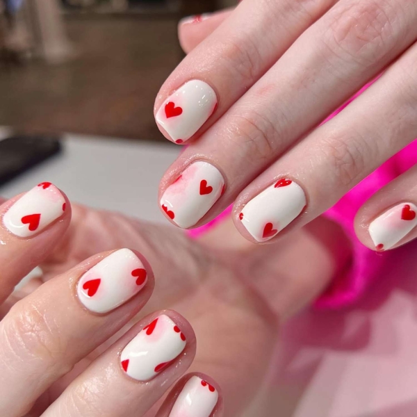 Since February is home to Valentine’s Day and Fashion Weeks worldwide, we say it’s prime time to embrace bright bold colors, top nail trends, and romantic themes. Here, explore some of our favorite manicures for the month, including obvious pink and red picks, along with a few timely nail trends.