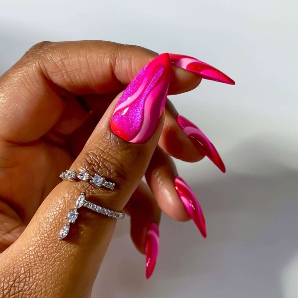 Since February is home to Valentine’s Day and Fashion Weeks worldwide, we say it’s prime time to embrace bright bold colors, top nail trends, and romantic themes. Here, explore some of our favorite manicures for the month, including obvious pink and red picks, along with a few timely nail trends.